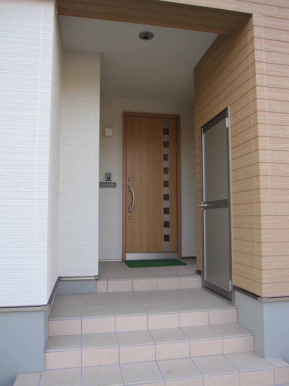 Entrance. There are external storeroom in the entrance next to, Convenient storage of small items of snow removal equipment and garden care