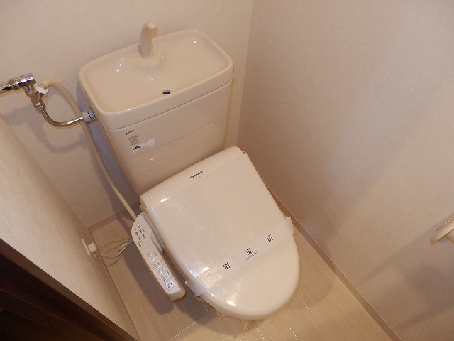 Toilet. Washlet is with