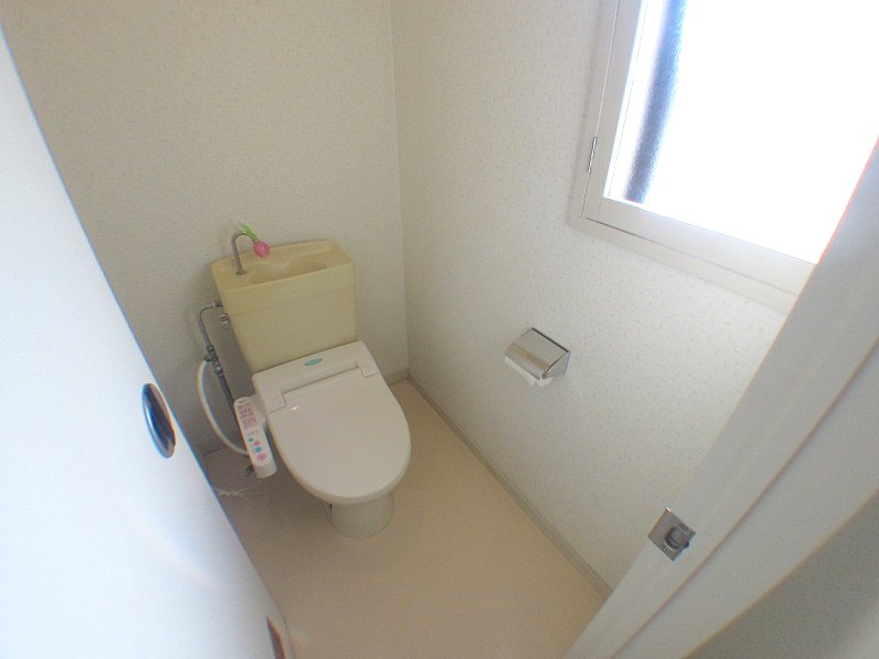 Toilet. Bidet with window