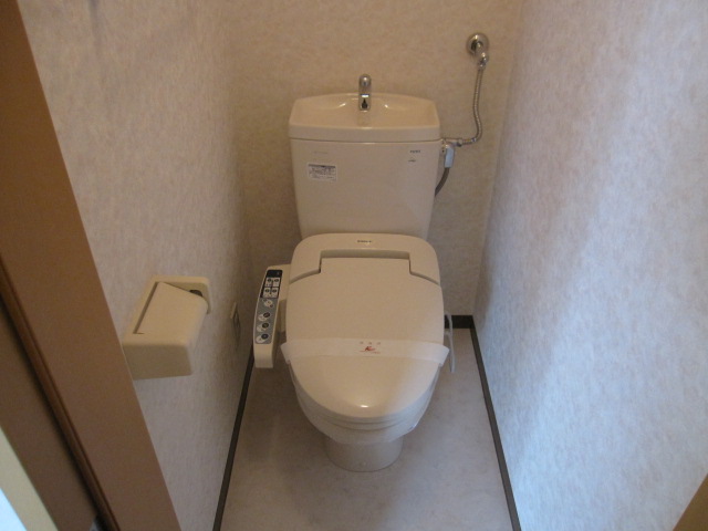 Toilet. Washlet is with