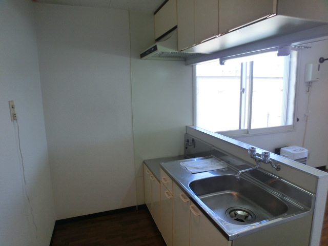 Kitchen. It is a photograph of the same type by Room No.