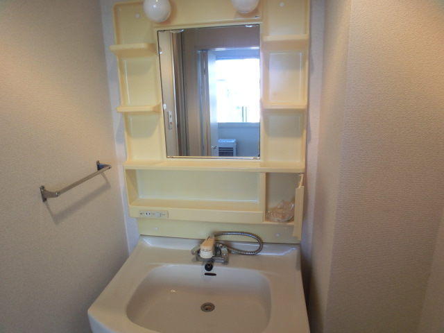 Washroom. It is a photograph of the same type by Room No.