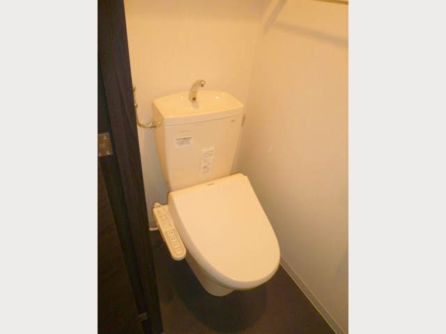 Toilet. Washlet is with