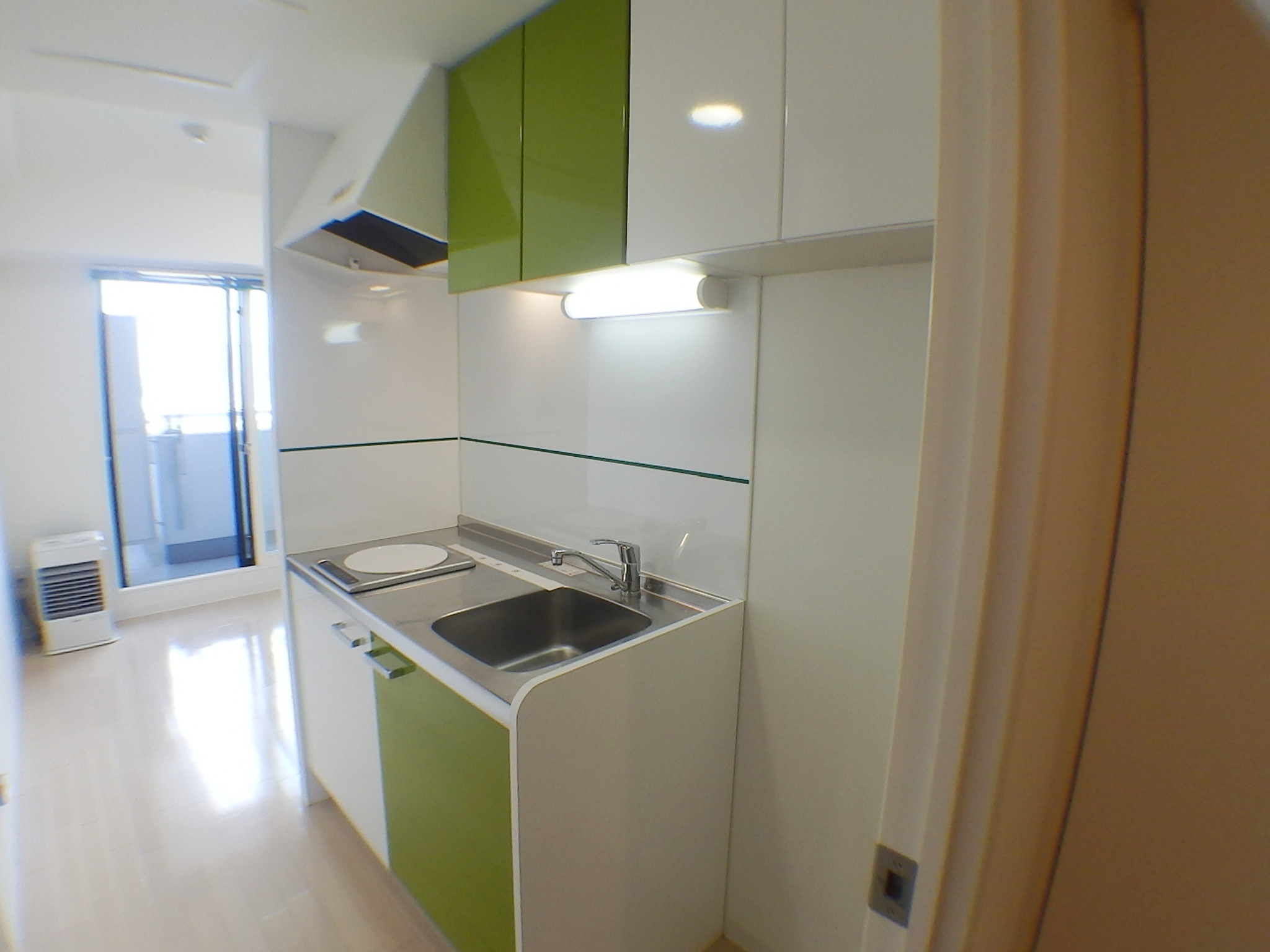 Kitchen. Green and stylish kitchen of white! 