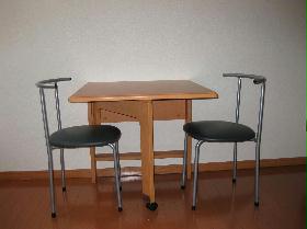 Living and room. Folding table and chairs