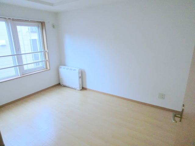 Other room space. There is also a heating appliance in each room.