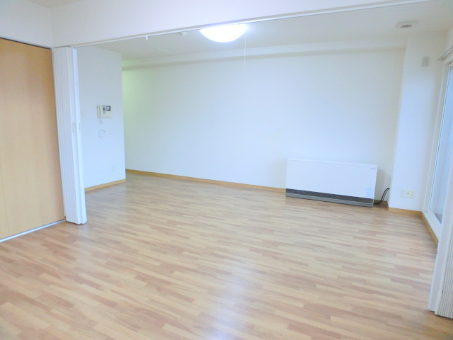 Other room space. It is located if an easy-going floor plan of furniture and home appliances.