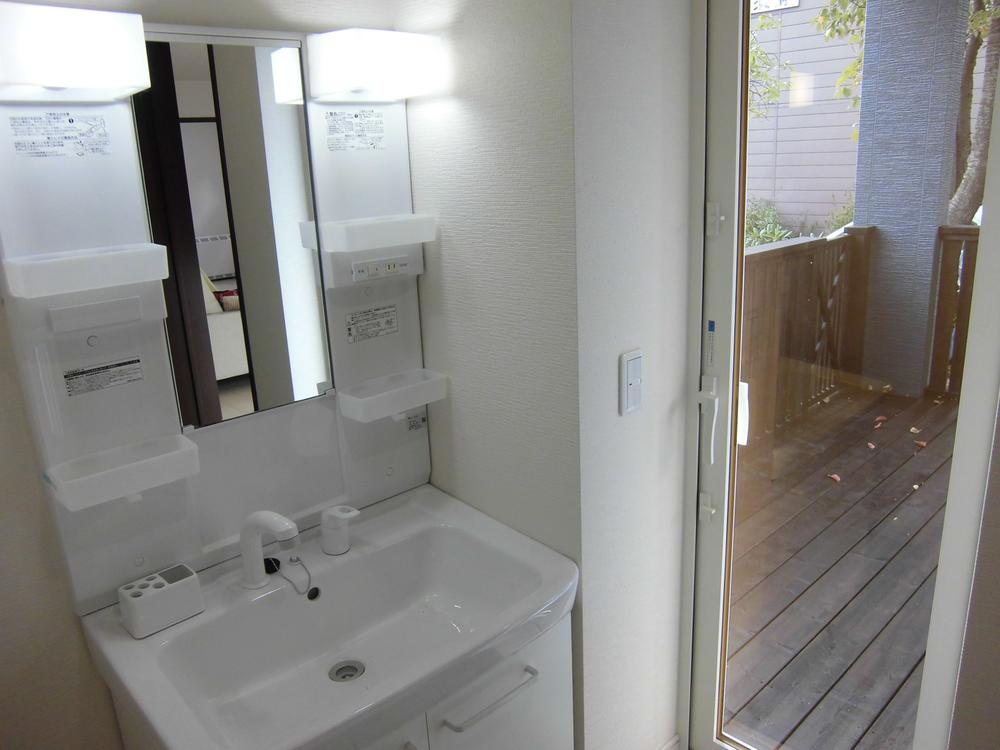 Entrance. Wash basin of the front door next to! You are out on a wooden deck.