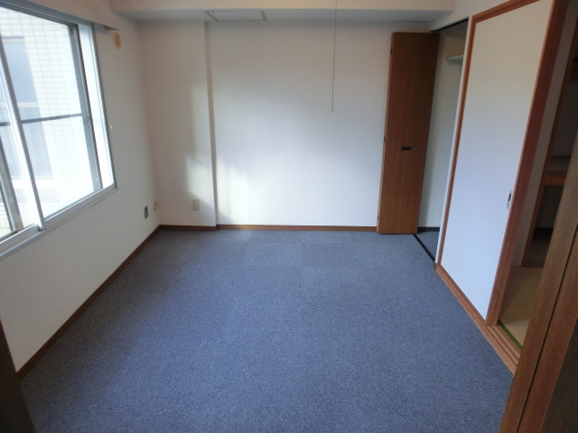 Other room space. This room is also sunny.