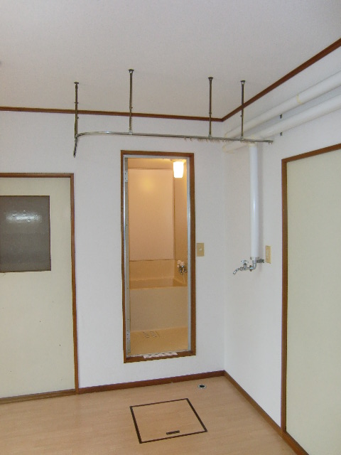 Other room space. You can make the dressing room because there is a curtain rail before the bath