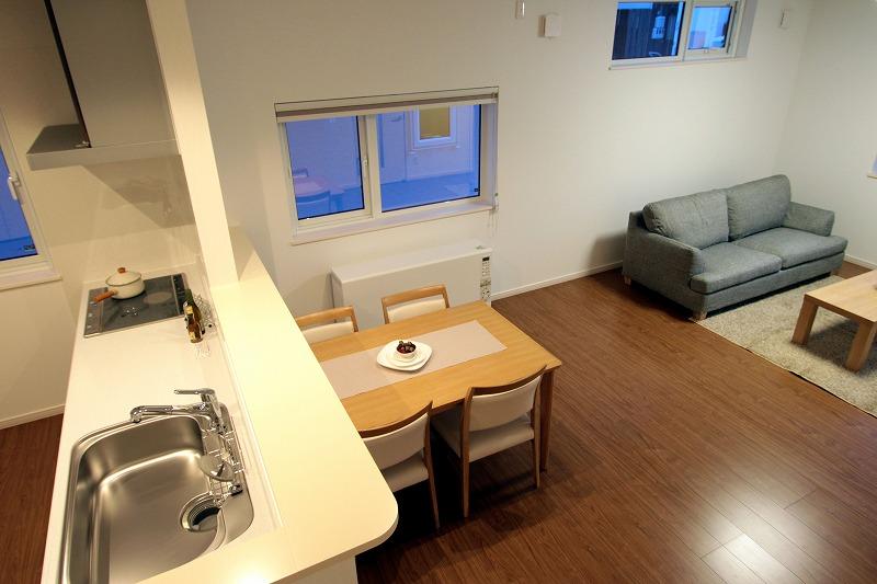 Kitchen. It overlooks the living who are a family from stairs