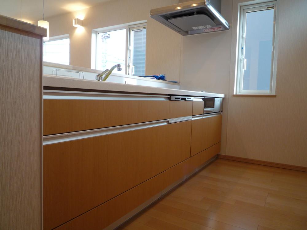 Kitchen.  Face-to-face kitchen is easy to spacious and work. Dish washing dryer, IH cooking heater, Shower Faucets, Enhancement also artificial marble top plate, such as kitchen facilities.