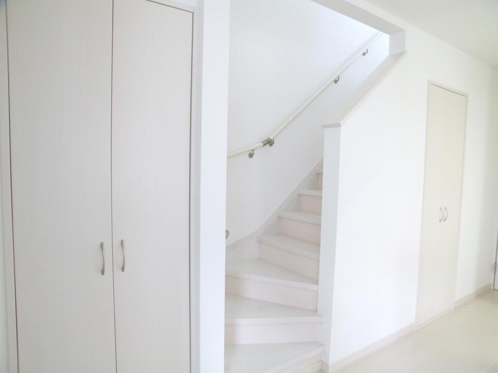 Living. Installation is also a closet and stairs under accommodated in the living room