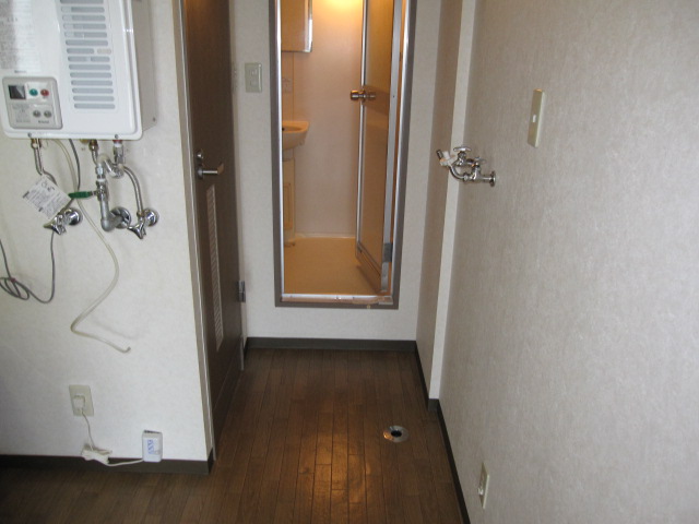 Other room space. There is a restroom and a bath in the kitchen back. 