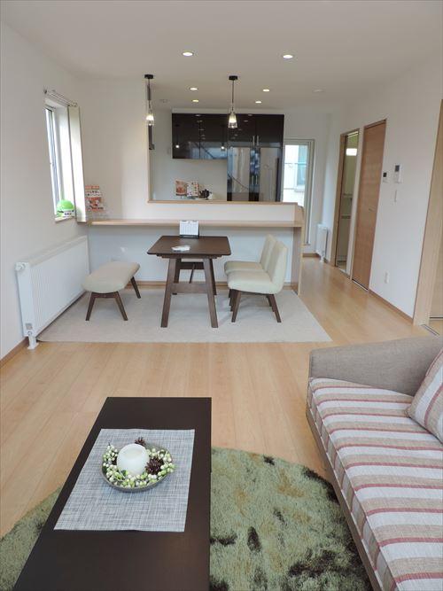 Living. It overlooks the entire living room from the kitchen