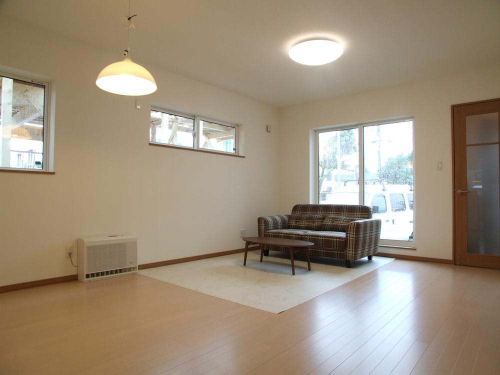 Living. Living is south-facing and sunny bright space with two faces lighting. Neat in plenty of storage utilizing the dead space under the stairs in the living room!