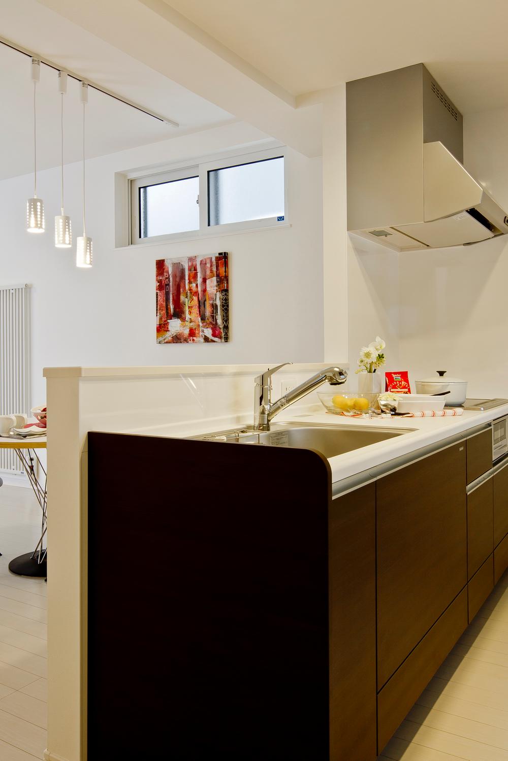 Kitchen. Face-to-face kitchen that can be overlooking the living. It increases the family of communication.