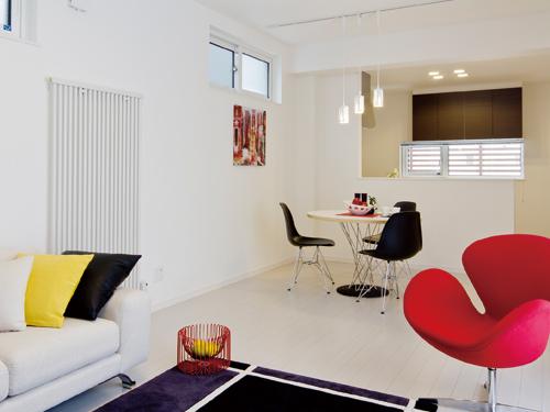 Living. Because there is a window to the kitchen side, Bright and open space.