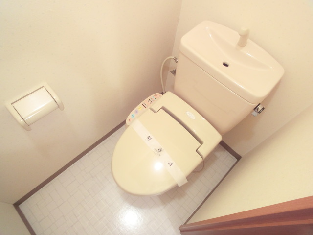 Toilet. Warm water washing toilet seat equipped
