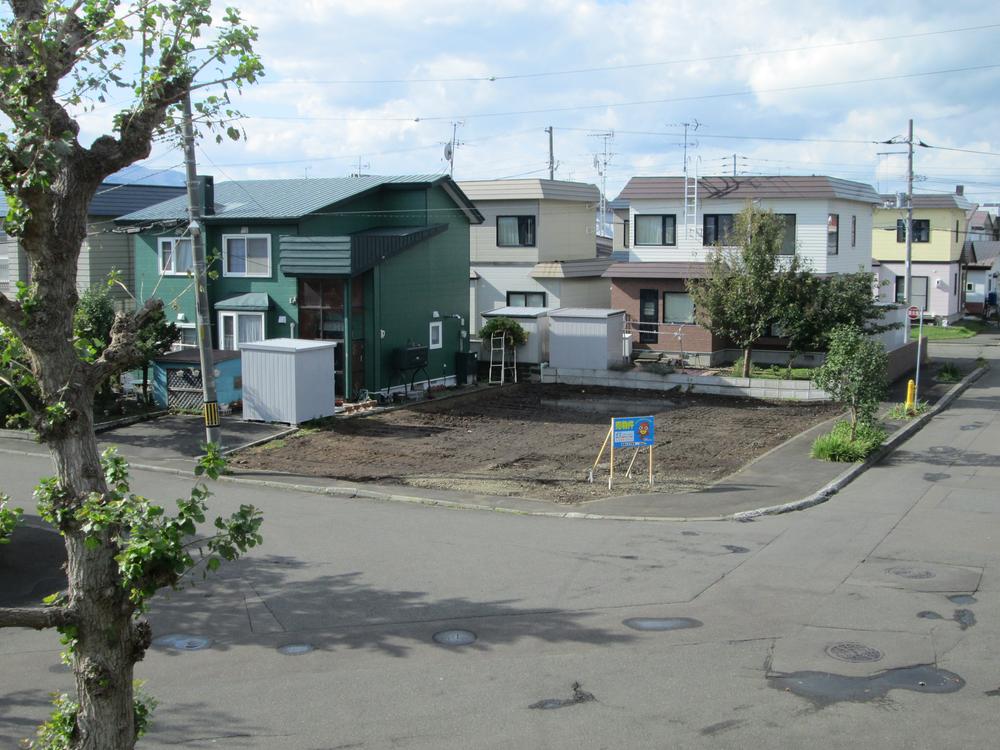 Local land photo. Less open-minded corner lot is building in front