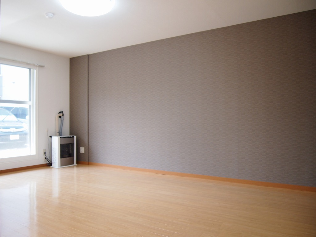 Living and room. Part of the living room wall is a design cross