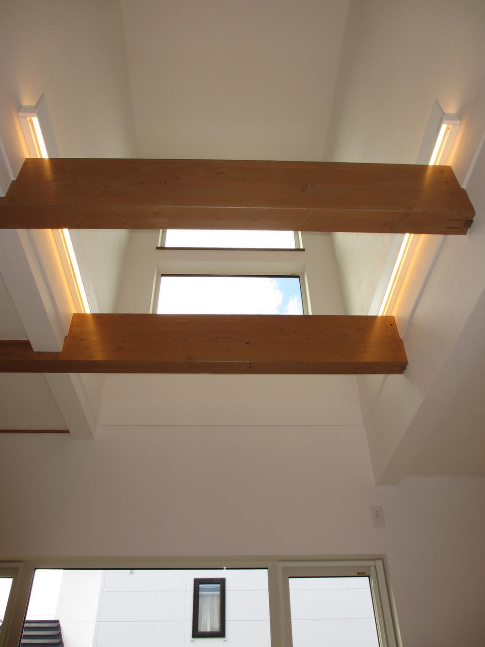 Living. Bright and airy living space attractions sunlight coming through the skylight of the atrium