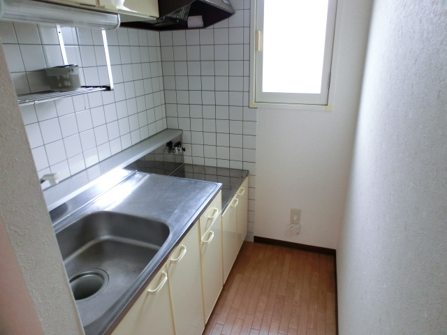 Kitchen. You can use a wide living room with independent kitchen. 