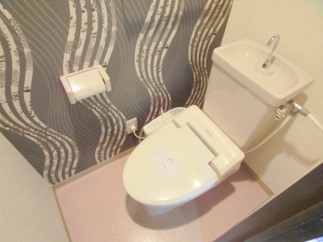 Toilet. Stylish design Cross