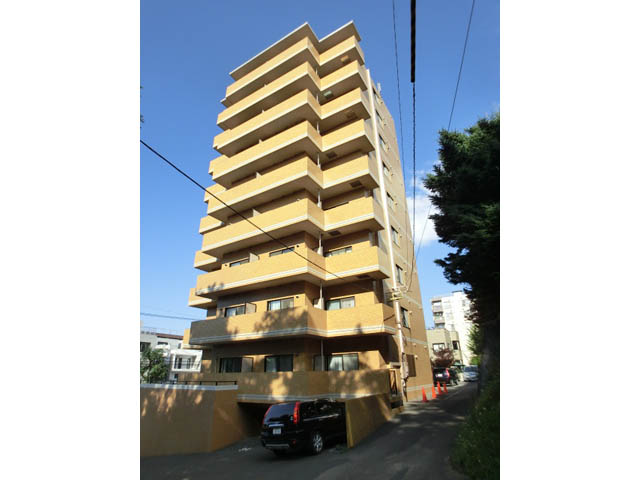 Building appearance. Yellow appearance is fashionable high-rise apartment. 