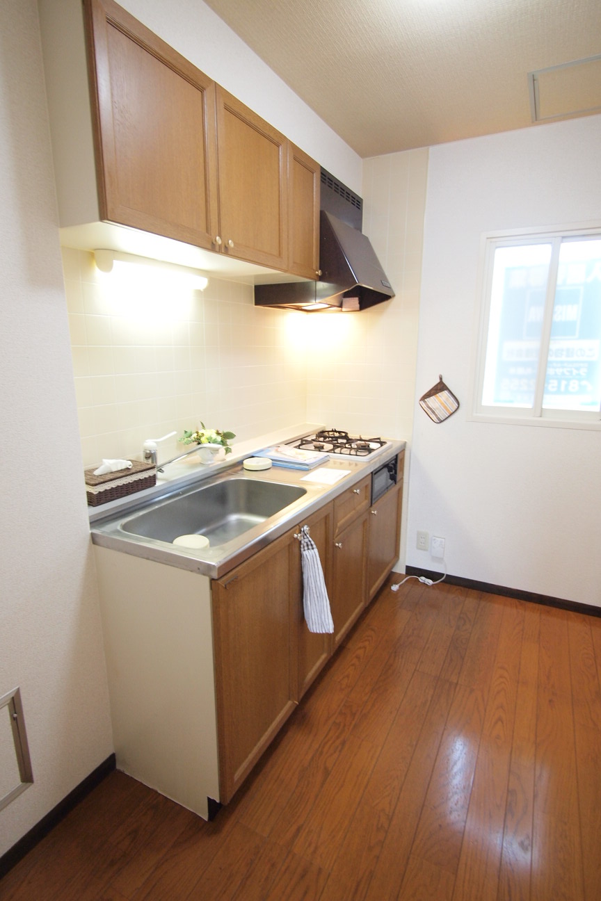 Kitchen. Bright system kitchen with window. 