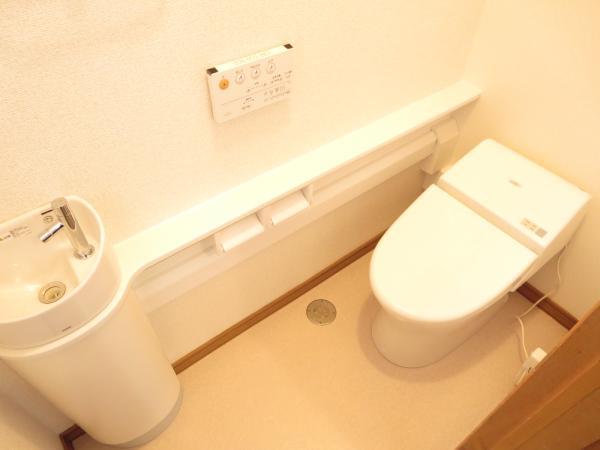 Toilet. Tankless toilet of TOTO is a new article. With hand washing