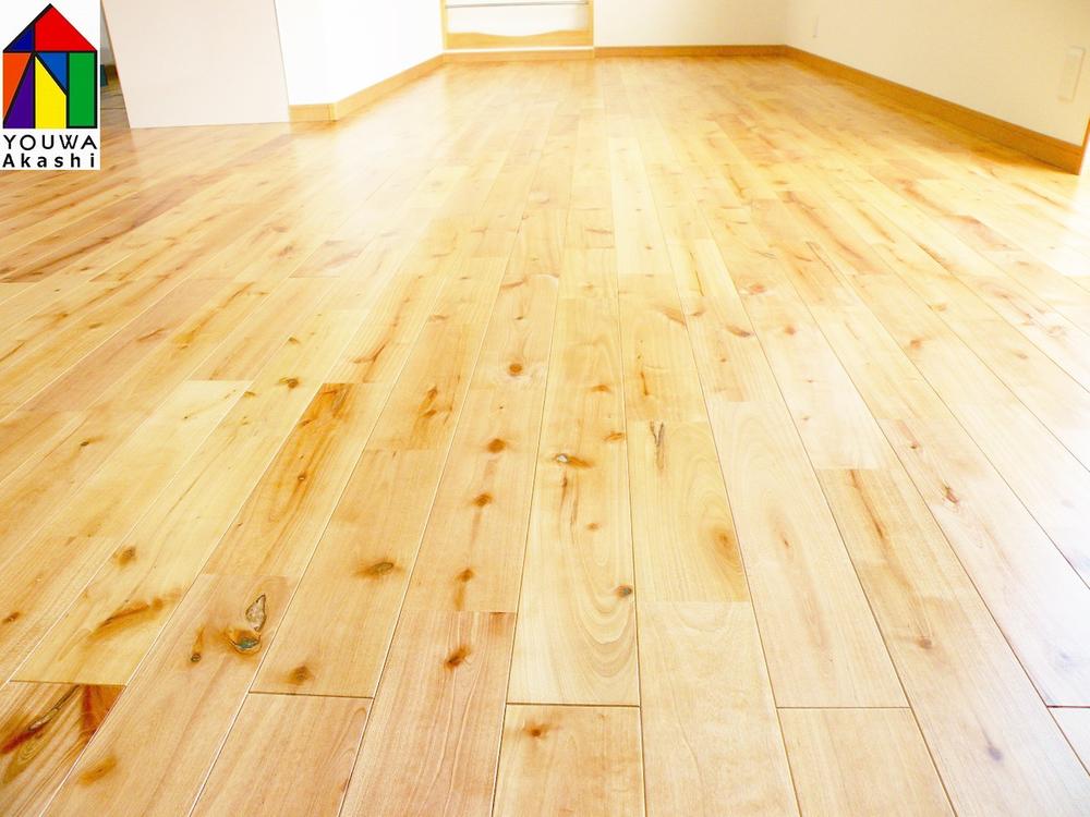 Other. Natural wood flooring with a soft warm in 1F