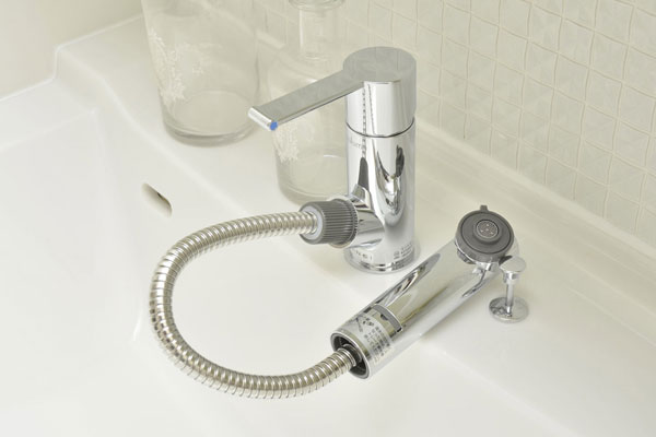 Bathing-wash room.  [Hand Shower Faucets] It can be used in a drawer, etc. during the bowl cleaning of, It is stretchy single lever (same specifications)