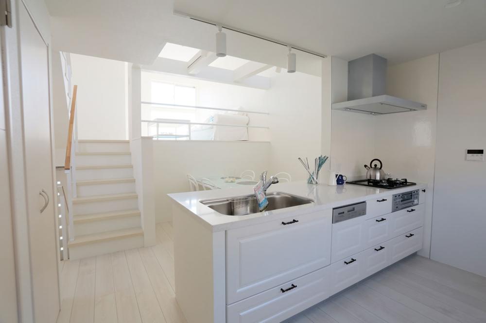 Kitchen. Face-to-face of the kitchen From dining to one step up living, Space overlooking the family (A-3)