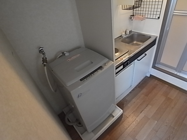 Other Equipment. Washing machine in the room