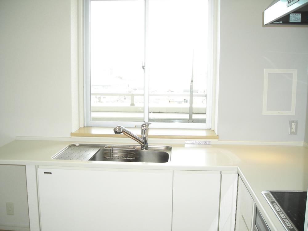 Kitchen. Bay window of the sink before the Balcony