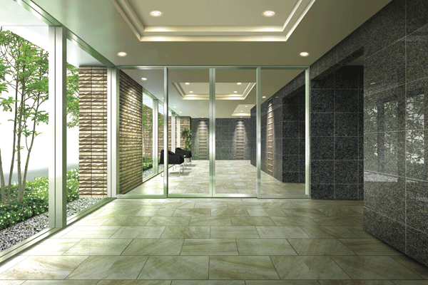 Features of the building.  [Entrance hall] Contrast of profound feeling and the sense of openness. It is the entrance hall, which was wrapped in a glass wall (Rendering)