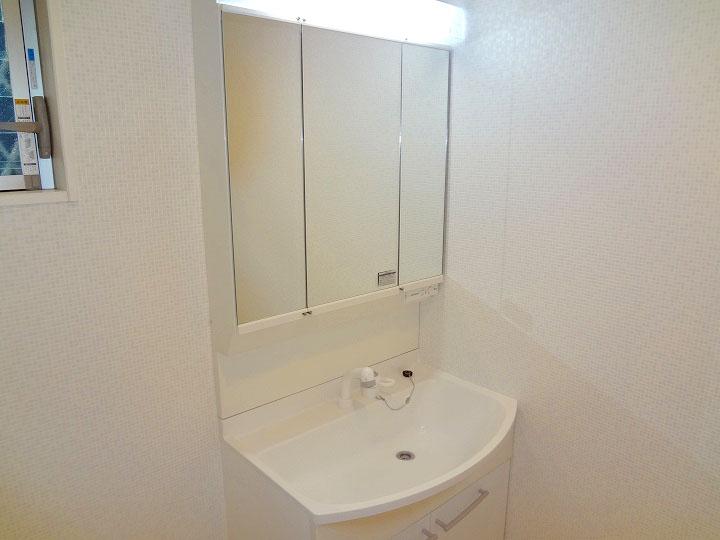 Wash basin, toilet. It is also beautiful vanity