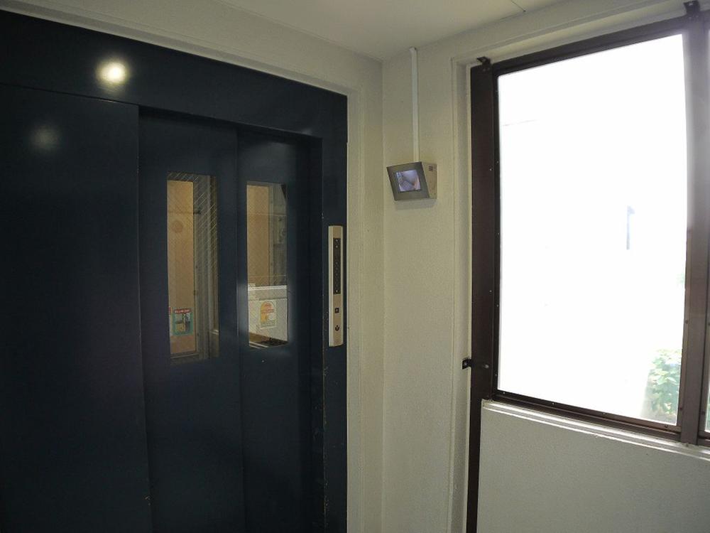 Other common areas. Elevator with a security camera