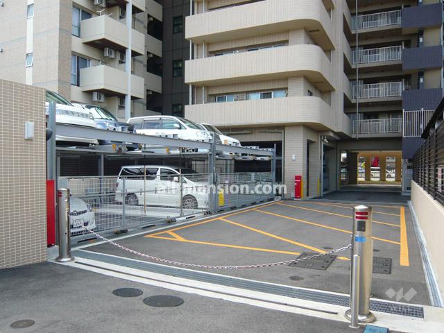Parking lot. On-site parking (entrance is a robot with a gate)