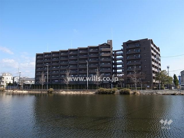 Hill photo. Green Corporation Sonoda of distant view (from the west) The site west has spread Nyakojiike.