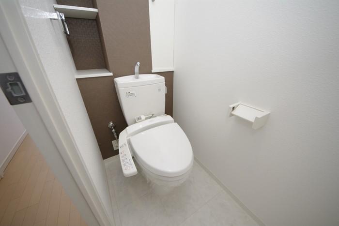 Toilet. It was also provided with a storage space in the toilet!