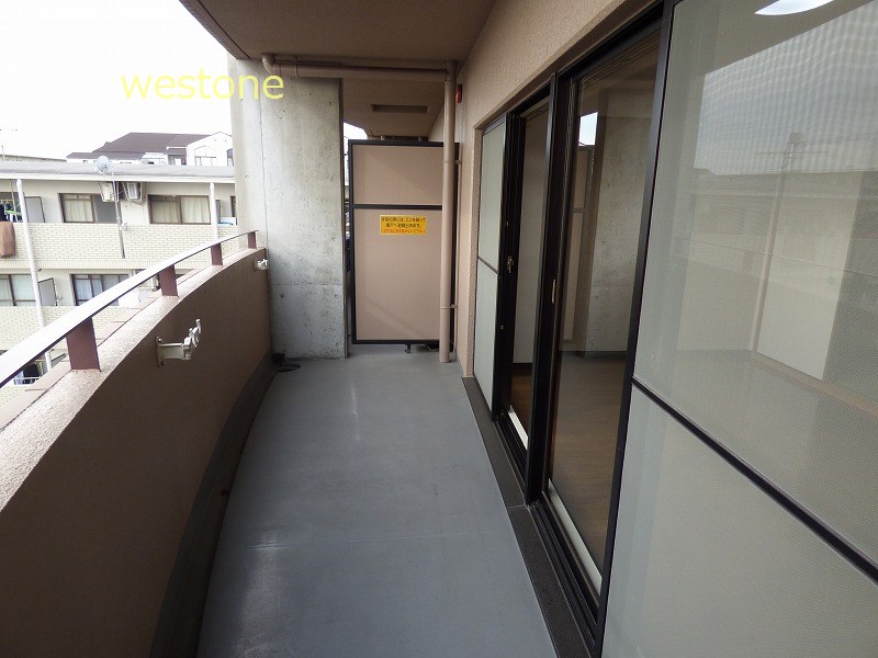 Balcony. Wide balcony facing the living room.