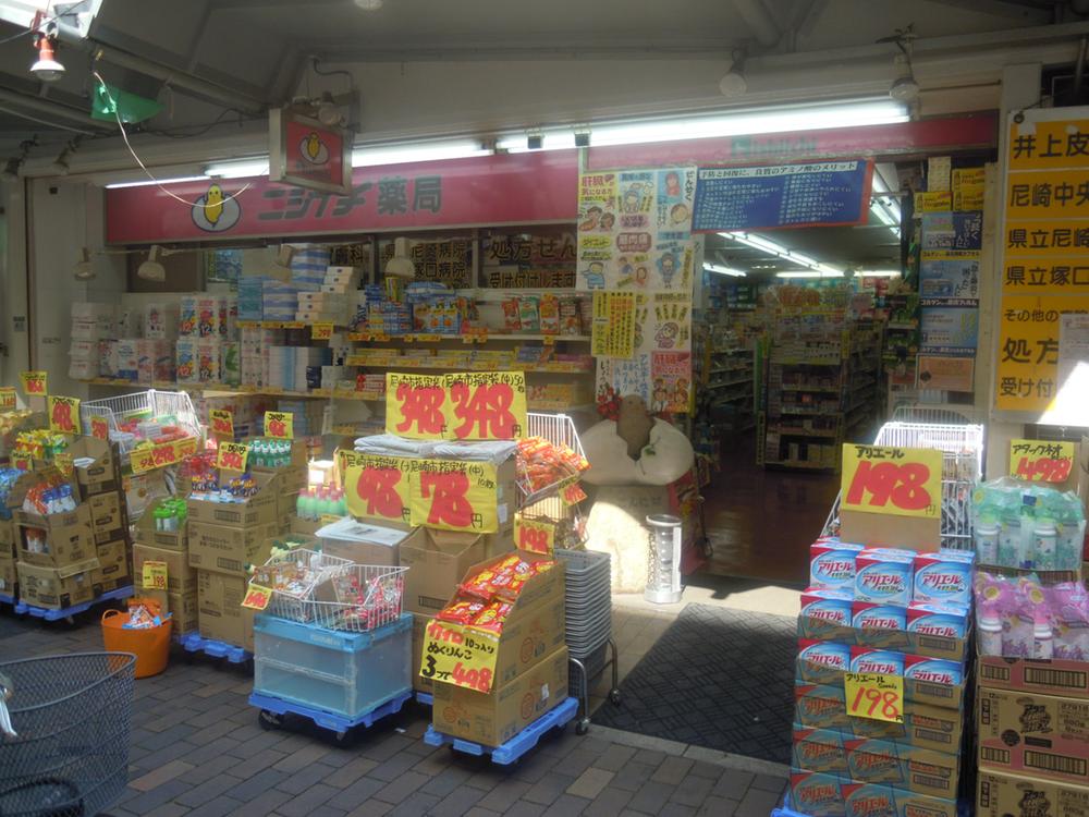 Drug store. Nishiichi pharmacy Aming to Shioe shop 469m