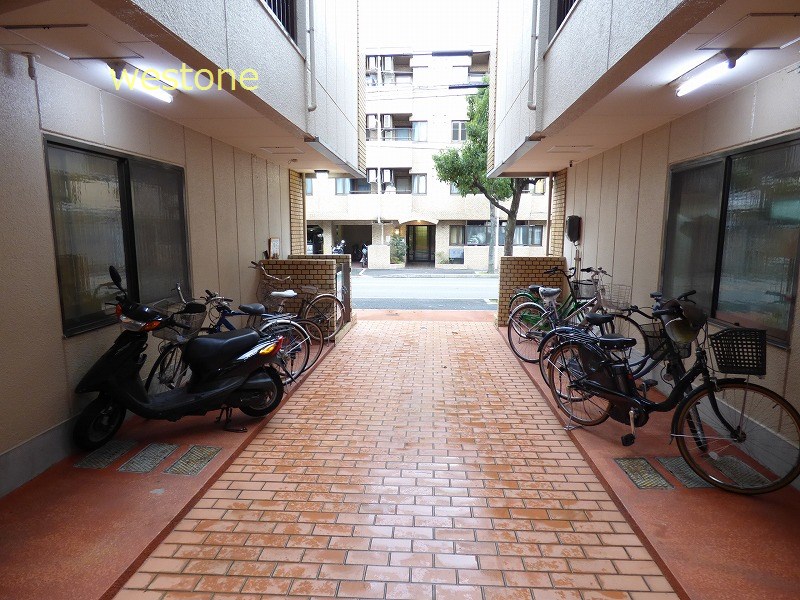 Other common areas. Entrance of parking lot, Bike shelter.
