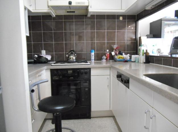Kitchen. The kitchen is U-shaped, State of the LD can be seen from a counterattack