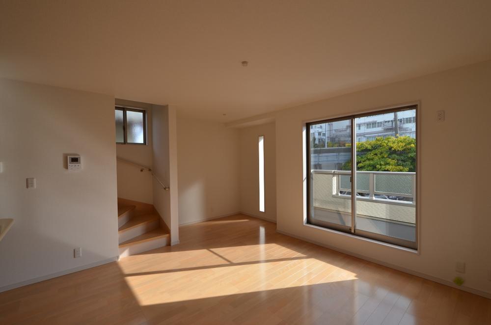 Living. Sunny south-facing living room