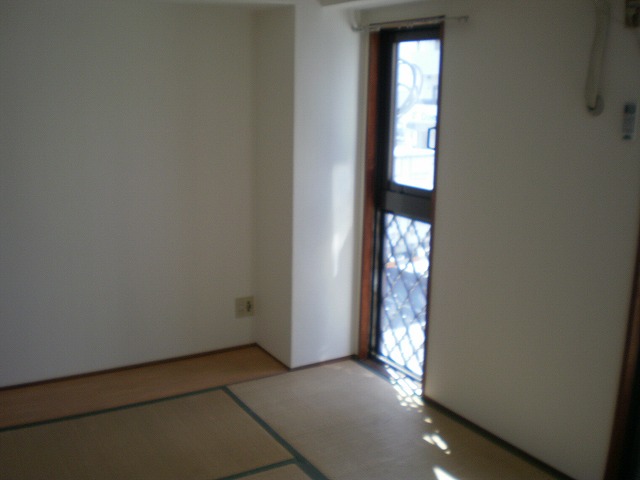 Other room space. There is a small window in the room