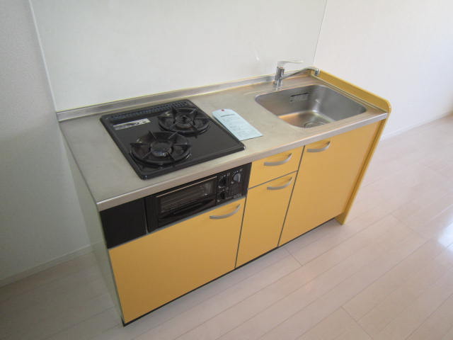 Kitchen. It's yellow kitchen is the female preference ~