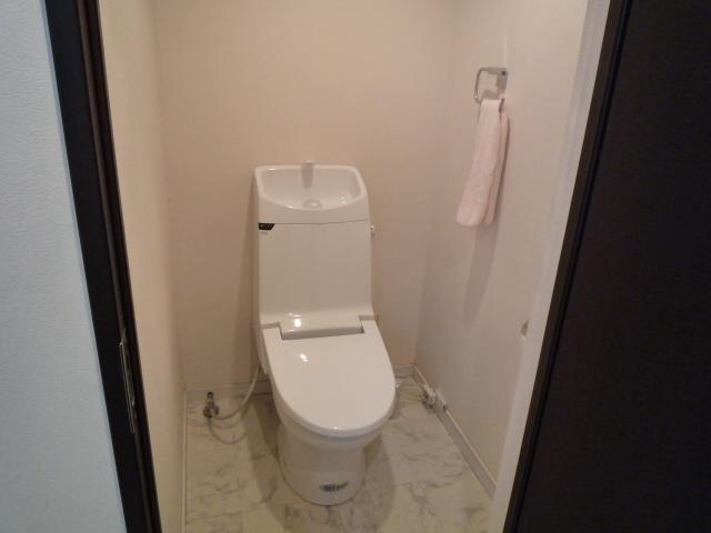 Toilet. Washlet comes with a.